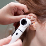 Ear exam with otoscope